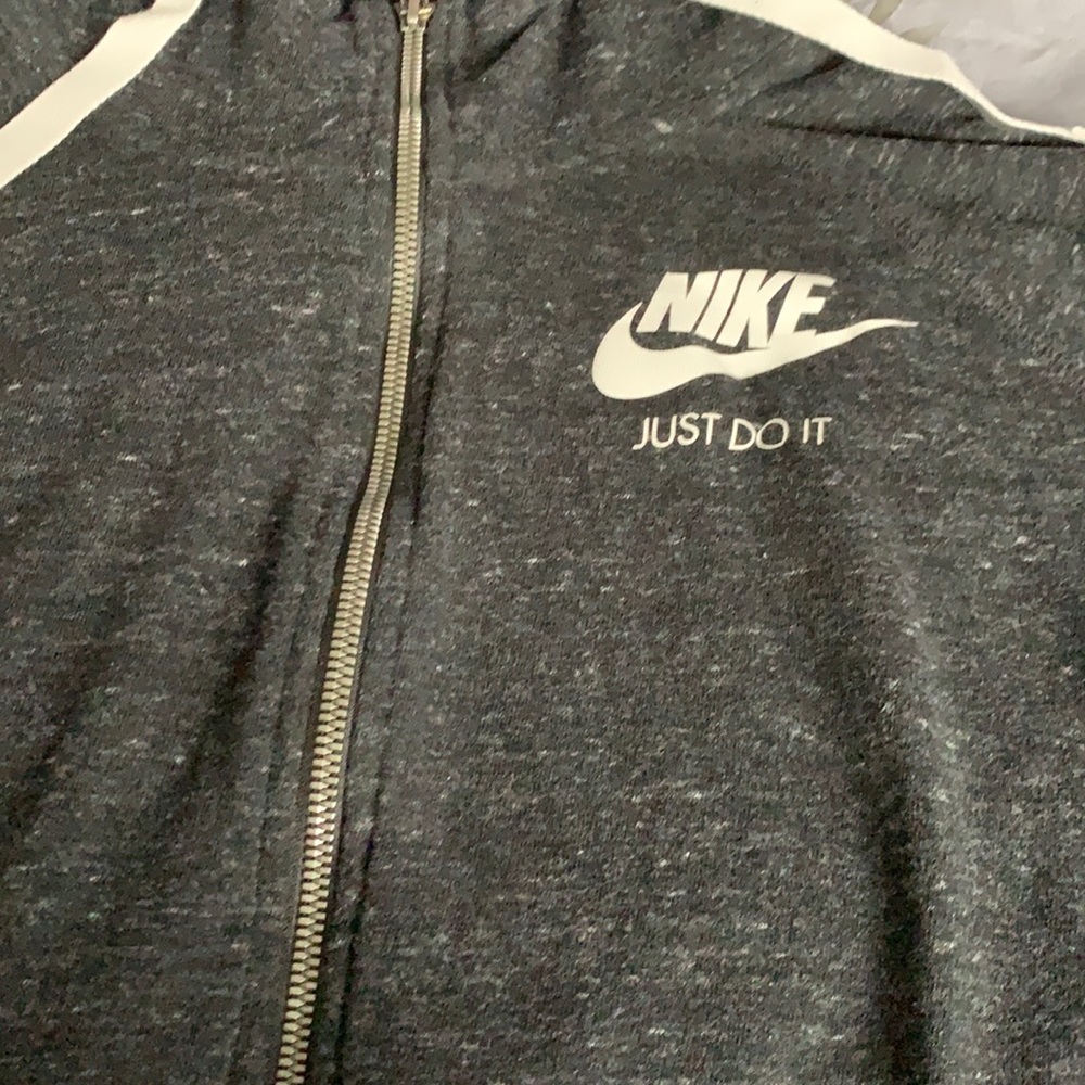 Nike dark gray light weight zip up sweatshirt. Gently used